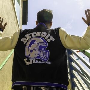 Detroit Lions Black and Cream Varsity Jackets. AVAILABLE IN DIFFERENT SIZES